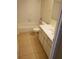 Bathroom features a tub and shower combination, along with a vanity providing a clean and functional space at 1108 Apple Ter, Leesburg, FL 34748