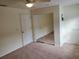 Bedroom with a ceiling fan and a mirrored closet at 1108 Apple Ter, Leesburg, FL 34748