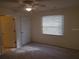 Bedroom featuring a ceiling fan, natural light and neutral carpet at 1108 Apple Ter, Leesburg, FL 34748