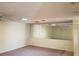 Spacious living room with a large mirrored wall at 1108 Apple Ter, Leesburg, FL 34748