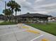 Outdoor pavilion with picnic tables and barbeque grills providing a great space for community gatherings and enjoying outdoor meals at 1108 Apple Ter, Leesburg, FL 34748
