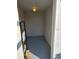 Small storage area with shelves and painted floor, perfect for organization at 1108 Apple Ter, Leesburg, FL 34748