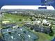 Aerial view of community amenities, including softball field, tennis courts, fitness center, and clubhouse at 1180 Mesa Verde Ct, Clermont, FL 34711