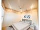 This bedroom boasts natural light, neutral paint, and a ceiling fan at 1180 Mesa Verde Ct, Clermont, FL 34711