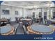 Spacious card/game room with multiple tables and comfortable seating for residents at 1180 Mesa Verde Ct, Clermont, FL 34711