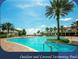 Stunning outdoor pool area with lush palm trees, a gazebo, and plenty of lounge seating at 1180 Mesa Verde Ct, Clermont, FL 34711