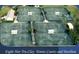 Aerial view of eight Har-Tru clay tennis courts and pavilions at 1180 Mesa Verde Ct, Clermont, FL 34711