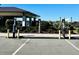 Community has electric vehicle charging stations at 12110 Grand Oak Ln, Oxford, FL 34484