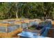 Enjoy fresh produce from the community garden's raised garden beds at 12110 Grand Oak Ln, Oxford, FL 34484
