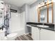 Well-lit bathroom with shower-tub, toilet, single vanity and neutral walls at 1224 Ballesteros Dr, The Villages, FL 32162