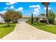 Charming single story home featuring a well manicured front yard and inviting curb appeal at 1224 Ballesteros Dr, The Villages, FL 32162