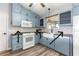 Bright kitchen featuring stainless appliances, a farmhouse sink, and lots of natural light at 1224 Ballesteros Dr, The Villages, FL 32162