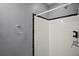 Clean bathroom with a stand-up shower and gray accent walls at 1301 Cambridge Dr, Leesburg, FL 34748