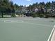 Outdoor basketball court ready for play and recreation on a sunny day at 1351 Legendary Blvd, Clermont, FL 34711