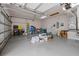 Spacious and organized garage with ample storage space and room for multiple vehicles at 1351 Legendary Blvd, Clermont, FL 34711