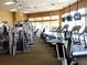 Well-equipped gym with modern cardio machines and weightlifting equipment for a complete workout at 1351 Legendary Blvd, Clermont, FL 34711
