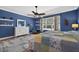 A very spacious bedroom featuring a ceiling fan and an area for sitting at 1556 Blue Grass Blvd, Deland, FL 32724