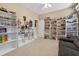 This cozy bedroom has shelves lining the walls at 1556 Blue Grass Blvd, Deland, FL 32724