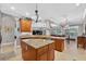 Bright kitchen featuring an island and eat in counterspace, plus modern lighting at 1556 Blue Grass Blvd, Deland, FL 32724