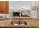 Close up of the kitchen sink overlooking the living room at 1556 Blue Grass Blvd, Deland, FL 32724