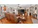 Living area with hardwood floors, a ceiling fan, and furniture at 1556 Blue Grass Blvd, Deland, FL 32724