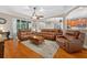 Cozy living room with hardwood floors and comfortable seating at 1556 Blue Grass Blvd, Deland, FL 32724