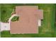 An aerial view of the home showing the roof, landscaping, and surrounding yard at 1721 Germakian Ln, The Villages, FL 32163
