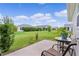 Spacious backyard with a patio and lush greenery at 1721 Germakian Ln, The Villages, FL 32163