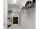 Well-organized walk-in closet featuring wire shelving, hanging space, carpeted floors, and a chest of drawers at 1721 Germakian Ln, The Villages, FL 32163