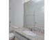 Bathroom featuring a granite countertop sink, toilet and tiled shower/tub combination providing modern style at 2019 Firethorn Loop, Haines City, FL 33844