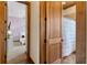 Hallway view showing access to a bedroom and bathroom at 23247 Lake Seneca Rd, Eustis, FL 32736