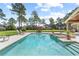 Refreshing swimming pool and patio area, perfect for enjoying the outdoors and entertaining guests at 23247 Lake Seneca Rd, Eustis, FL 32736