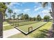 These pristine bocce ball courts offer a leisurely and fun outdoor activity for residents and guests at 2400 Pawtucket Pass, Mount Dora, FL 32757