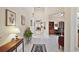 Inviting foyer featuring tile flooring, neutral walls, and an open floor plan at 2400 Pawtucket Pass, Mount Dora, FL 32757