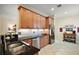 Kitchen featuring stainless steel appliances, dark granite countertops and tiled backsplash at 2400 Pawtucket Pass, Mount Dora, FL 32757