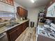 This cozy kitchen boasts sleek countertops, stainless steel appliances, and ample cabinet space at 2433 Adams Ave, Deltona, FL 32738