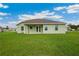 Backyard featuring a patio and ample space for outdoor activities at 2495 Se 75Th Blvd, Bushnell, FL 33513