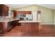 Open-concept kitchen featuring a large island, stainless steel appliances, and plenty of cabinet space at 2495 Se 75Th Blvd, Bushnell, FL 33513