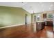 Bright and open kitchen with hardwood floors and stainless steel appliances at 2495 Se 75Th Blvd, Bushnell, FL 33513