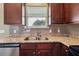 Close up on the kitchen sink, backsplash, and countertop at 2495 Se 75Th Blvd, Bushnell, FL 33513