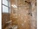 The luxury shower is adorned with ceramic tile and features built in seating and a rainfall shower head at 2495 Se 75Th Blvd, Bushnell, FL 33513