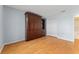 Bedroom features laminate floors, and a built-in wardrobe at 2557 Privada Dr, The Villages, FL 32162