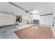 This ample garage space features built-in storage and a laundry area, for a more efficient utility at 2557 Privada Dr, The Villages, FL 32162