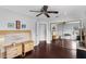 Comfortable bedroom with a mirrored closet, wood floors, and neutral paint at 2610 Florence Dr, Kissimmee, FL 34744