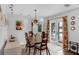 Dining room with access to pool area, stylish decor, and an open floor plan at 2610 Florence Dr, Kissimmee, FL 34744