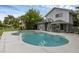Stunning home exterior featuring a pool, balcony, and well-maintained landscaping, blending elegance and comfort at 2610 Florence Dr, Kissimmee, FL 34744