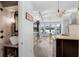 Kitchen with modern lighting, stainless appliances, peninsula island, and eat-in area at 2610 Florence Dr, Kissimmee, FL 34744