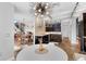 Bright kitchen featuring modern appliances, a unique light fixture, and an open floor plan at 2610 Florence Dr, Kissimmee, FL 34744