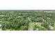 Aerial view of the wooded property at 27113 Robertson Rd, Yalaha, FL 34797