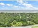 Aerial view of property line with lake view at 27113 Robertson Rd, Yalaha, FL 34797